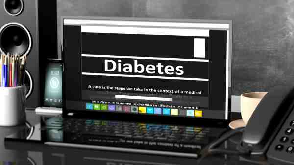 A smartphone and laptop displaying the word 'Diabetes', symbolizing digital resources such as websites, apps, and books for managing diabetes.