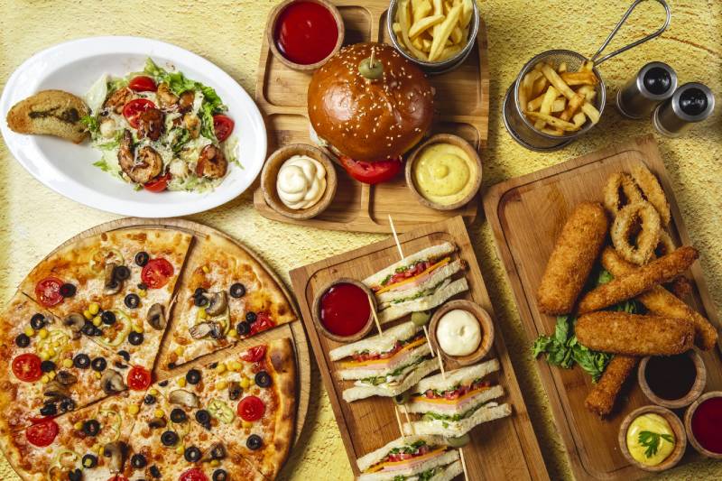 Bread, pasta, noodles, grains, lentils, and rice cakes representing poor dietary choices that can contribute to diabetes.