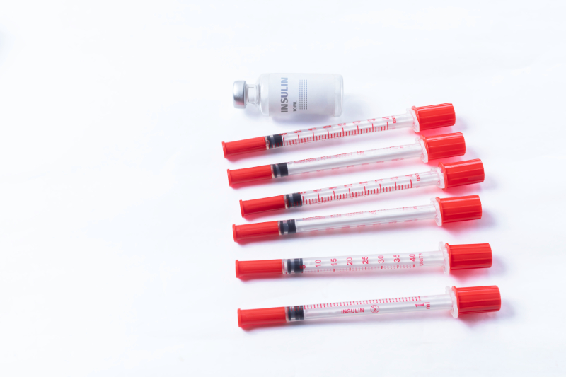 Close-up of an insulin injection symbolizing blood sugar control.