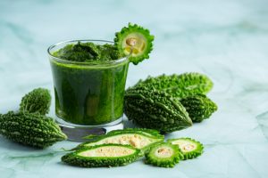 A glass of bitter gourd smoothie used as a home remedy to help control diabetes.