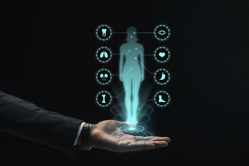 Holographic body with health icons illustrating modern tech innovations for diabetes care.