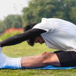 A man exercising in a park, symbolizing the importance of physical activity in improving insulin sensitivity for diabetes.