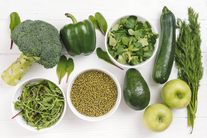 Healthy foods like vegetables, pulses, and fruits illustrating the importance of diet in elderly diabetes care.
