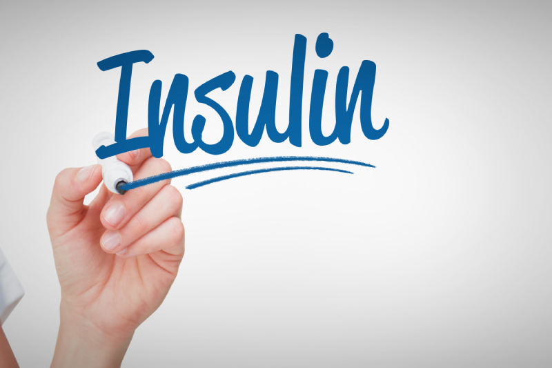 'Insulin'written in blue marker with an underline, symbolizing the Diabetes Insulin Therapy Guide.