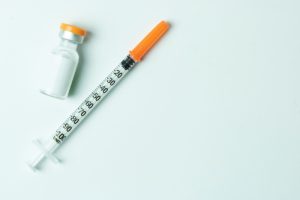 An insulin injection needle representing the various types of insulin that help regulate blood sugar levels.