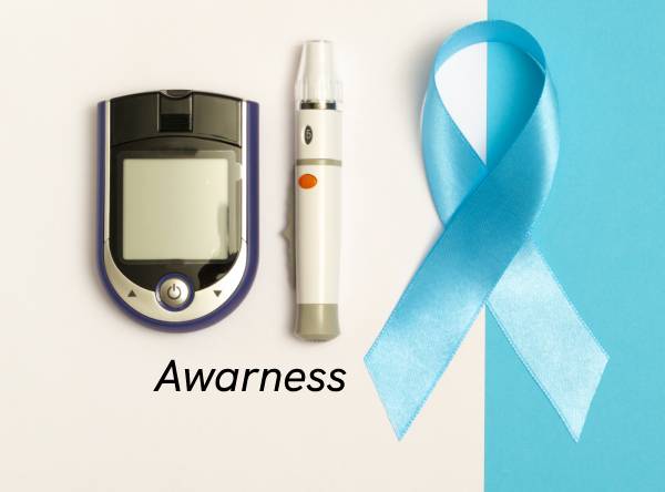 Glucometer, pen, and awareness ribbon symbolizing the importance of diabetes testing in the workplace.