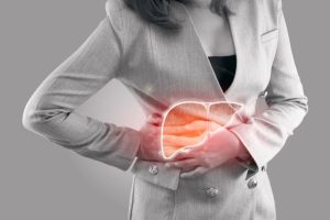 Woman in stomach pain representing impaired pancreatic function in Type 1 diabetes.