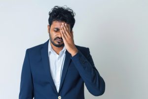 A stressed man with diabetes, showing how adrenal glands release hormones that rapidly increase blood sugar levels.