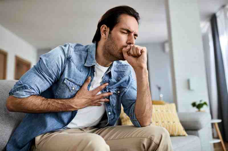Person coughing severely, which worsens a heart attack and is not relieved by CPR.