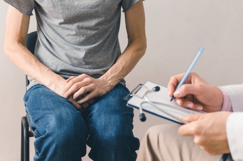 A man visits a doctor, for prostate health and common male prostate issues.