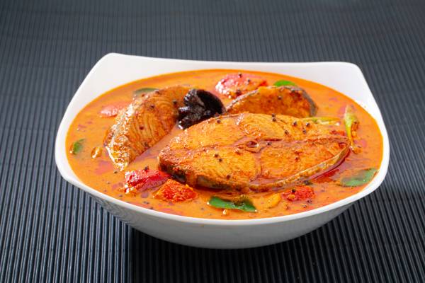 Fish curry with tamarind, a healthier choice over fried fish, offering a unique, flavorful taste.