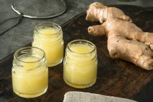 Ginger helps digestion by boosting enzymes that break down food and improve nutrient absorption.