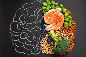A brain-shaped design made from healthy foods, symbolizing nutrition's boost to kids' cognitive growth.