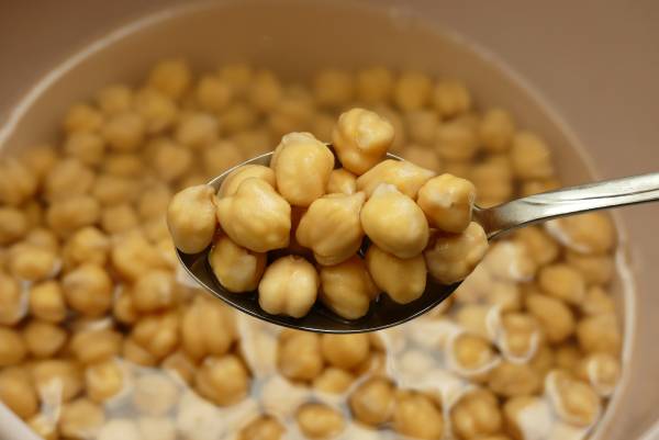 Soaking chickpeas overnight in water shortens cooking time and helps break down digestion-blocking compounds.