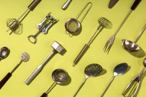 Stainless steel kitchen tools, safe cookware for healthy cooking as FSSAI advises using non-reactive utensils.